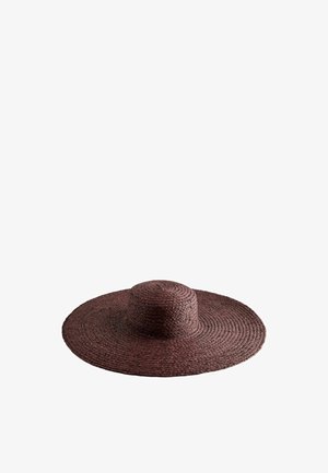 Wide-brimmed dark brown woven straw hat with a round crown, shown flat on a white background.