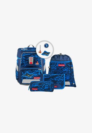 Blue backpack set featuring a large backpack, a drawstring bag, a pencil case, and a smaller pouch; all in a wave pattern with red accents.