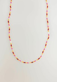 Beaded necklace featuring a variety of colored beads in red, pink, yellow, and white, arranged in a repeating pattern along a flexible strand.
