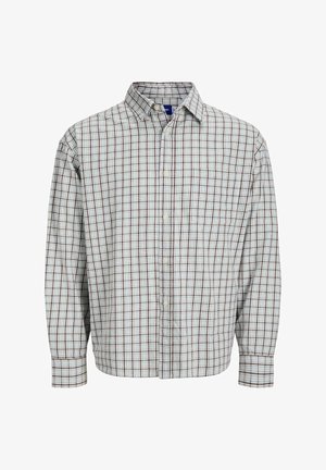 Chemise à manches longues avec un motif à carreaux bleu clair et marron, dotée d'une poche poitrine et d'un col arrondi. En mélange de coton.