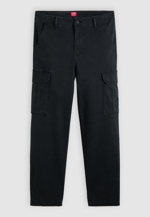 Juodos medvilninės krovinių kelnės su dviem šoninėmis kišenėmis, dviem šlaunies kišenėmis, sagties užsegimu priekyje ir tiesiomis kojų linijomis.