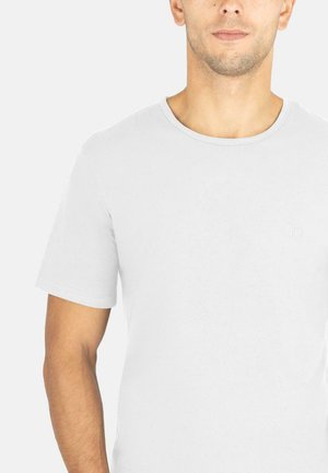 White short-sleeve t-shirt made of cotton with a round neckline, featuring a subtle logo accent on the chest and a soft texture.