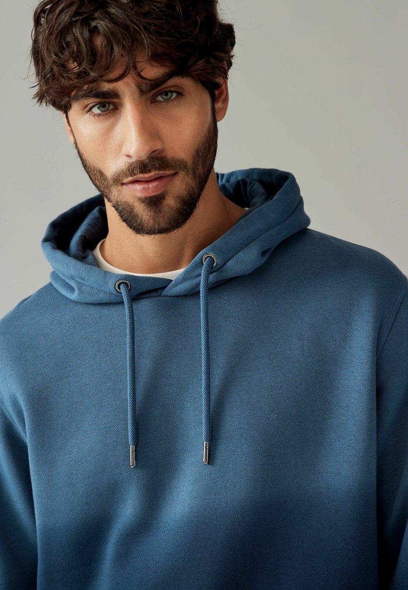 Pull à Capuche Peak Performance Homme Grand Logo Hood Blue Shadow