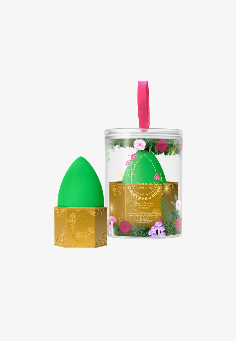 Groene mengspons in een gouden octagonale basis, verpakt in een heldere cilindervormige container met bloemaccenten en een roze lint-handvat.