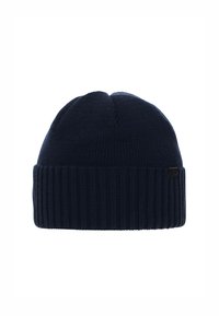 Berretto lavorato a maglia blu navy con bordo a costine. Presenta una texture liscia e una piccola etichetta nera sul lato. Forma arrotondata classica.