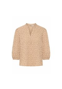 Blouse couleur pêche avec un col en V et des manches ballon trois-quarts, présentant un motif texturé de petits points noirs partout.