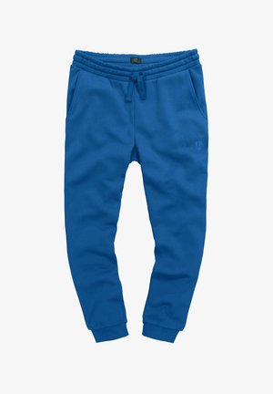 Pantaloni della tuta blu realizzati in tessuto morbido, con vita elasticizzata, cordoncino, tasche laterali e polsini a costine. Dettaglio del logo discreto.