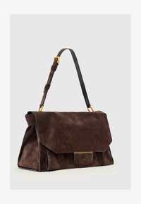 Geselecteerd, bitter brown