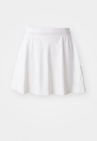 Jupe de sport blanche avec ceinture élastique et logo discret près de l'ourlet, conçue pour le sport ou une tenue décontractée.
