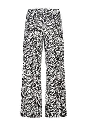Wijde broek met zwart-witte zebraprint. Gemaakt van lichtgewicht stof, met een elastische tailleband en een vloeiende pasvorm.