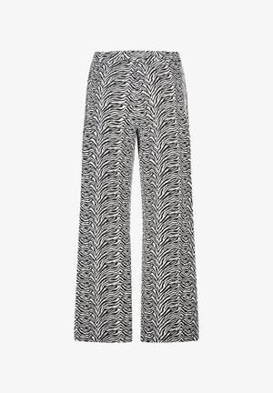 Pantalon à jambes larges avec imprimé zèbre noir et blanc. Confectionné dans un tissu léger, doté d'une ceinture élastique et d'un tombé fluide.