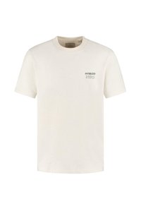 Camiseta de algodón en color blanco roto con cuello redondo, mangas cortas y un pequeño logo impreso en el pecho. Tejido texturizado con un ajuste holgado.