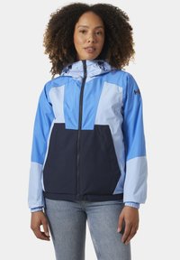 Lichte, bicolor jacket in blauw en marineblauw, met een ritssluiting vooraan, capuchon, elastische manchetten en een geometrisch paneelontwerp.