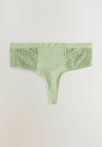Groene stringonderbroek met een gladde voorkant en bloemenkant zijpanelen. Heeft een dunne elastische tailleband en een naadloze constructie voor comfort.