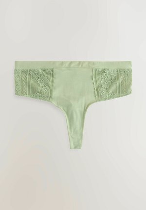 Zaļa tangas veida apakšveļa ar gludu priekšpusi un ziedu mežģīņu sānu paneļiem. Tam ir plāns elastīgs josta un bezšuvju konstrukcija ērtībai.