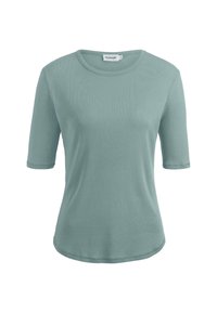 Lyhythihainen turkoosi paita, joka on valmistettu pehmeästä kankaasta, pyöreällä kaula-aukolla ja hiukan kaarevalla helmanmuodolla. Paidan pinta on sileä ilman koristeita.