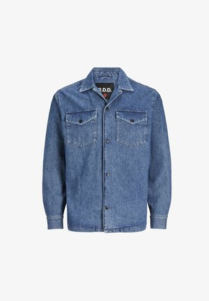 Mėlyna džinsinė striukė su sagų užsegimu, smailiu užkaliu, dviem krūtinės kišenėmis ir ilgomis rankovėmis su sagomis.