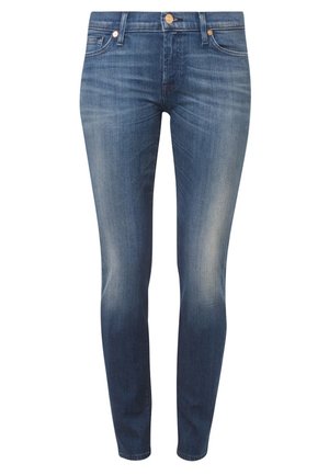 Tætsiddende jeans i medium vask denim, med en mellemhøj talje, frontlommer og et subtilt falmet mønster. Knapper og nitter i metalfinish.