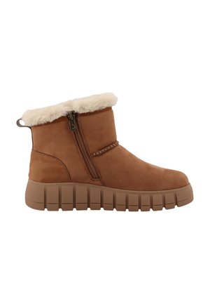 Brauner Knöchelstiefel mit dicker Gummisohle, seitlichem Reißverschluss und cremefarbenem, flauschigem Innenfutter, entworfen für Komfort bei kaltem Wetter.