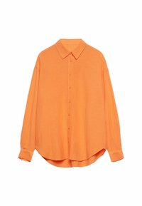 Orange long-sleeve button-up shirt with a collar, made of a textured fabric, featuring a curved hem and loose fit. Buttons down the front.
