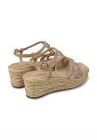 Beige wedge sandals with braided jute heels, decorated with sparkling straps. Buckle closure; soft footbed with brand name embossed inside.