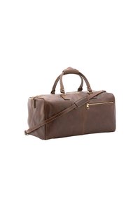 Duffle bag en cuir brun avec poignées doubles, bandoulière réglable, fermetures éclair en ton doré, et une poche latérale avec des détails de couture visibles.