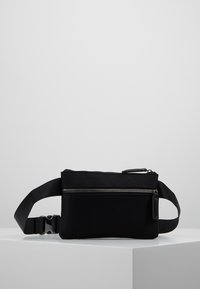 Zign Bältesväska - black
