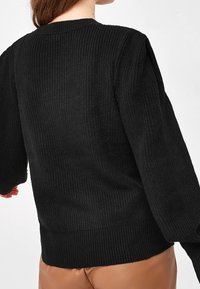 Next Sweter