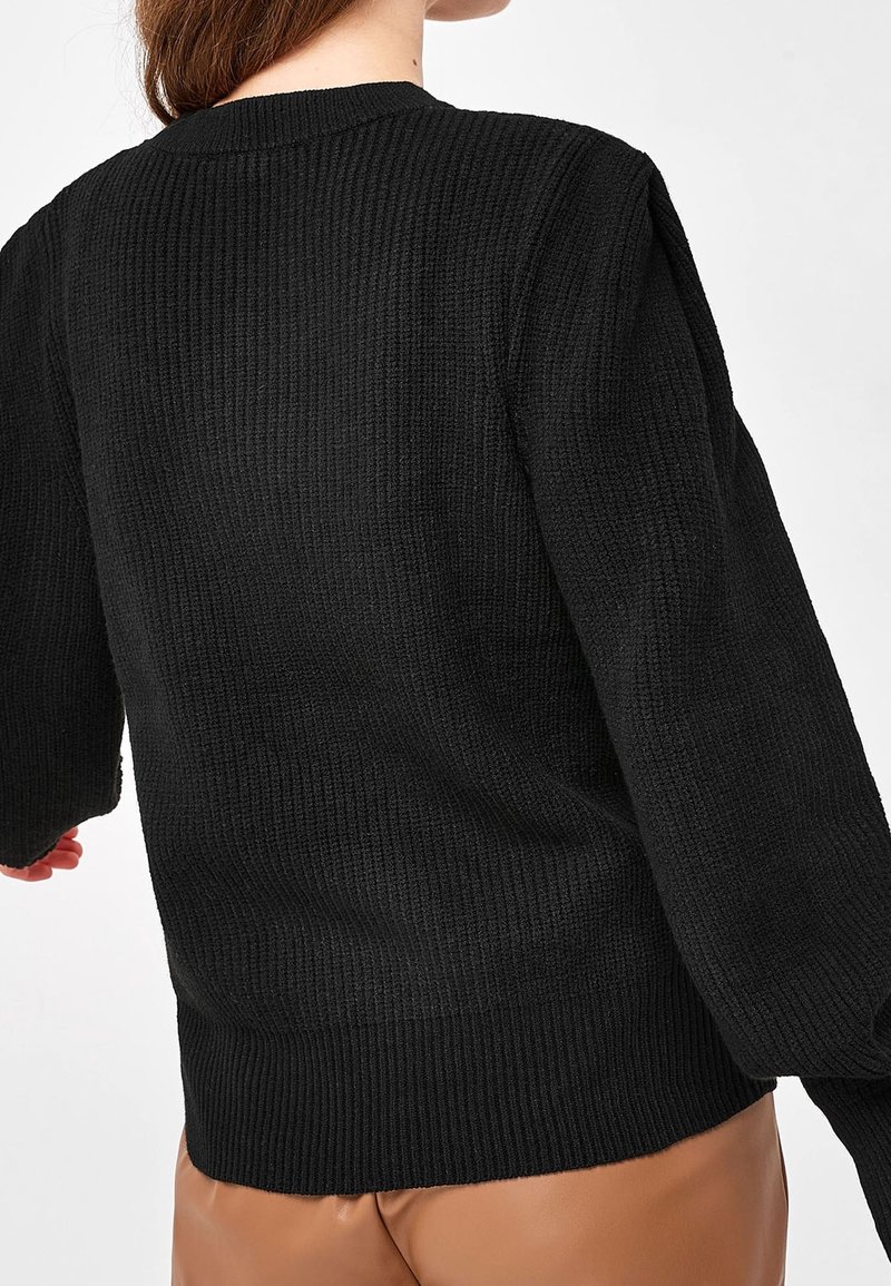 Next Sweter