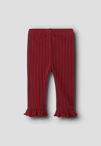 Czerwone prążkowane legginsy z rozkloszowanym dołem. Wykonane z miękkiego materiału, z pionowymi paskami i elastycznym pasem. 