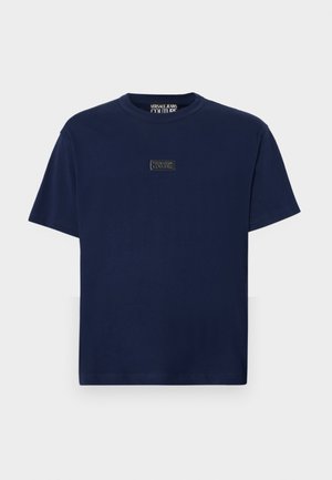 Marineblauw T-shirt met korte mouwen van katoen, voorzien van een rechthoekige logopatch op de borst. Klassieke ronde hals en een relaxed fit.