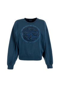Sudadera azul marino con cuello redondo, mangas con caída y dobladillo acanalado. Presenta un logo circular texturizado con elementos metálicos en la parte delantera.