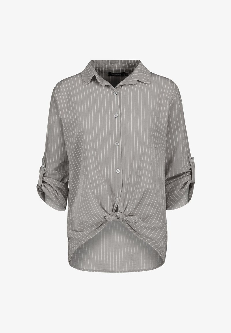 Gray striped blouse with a button-down collar, rolled-up sleeves, and a knotted front. Made of lightweight fabric with a smooth texture.
