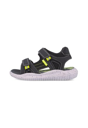 Sandal negra y gris con dos correas ajustables, plantilla texturizada y suela de goma blanca moteada, con detalles en verde.