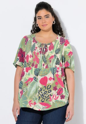 Top con motivo floreale che presenta tonalità di verde, rosa e blu, con maniche corte e scollo rotondo, dettagli legati al collo.