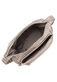 Beige fabric handbag with a zippered top, two compartments, and a detachable clip. Smooth texture with shiny silver hardware accents.