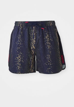 Marine zwemshorts met een goud en groen abstract patroon, een elastische tailleband met koord, en een rode logo-detail aan de zijkant.