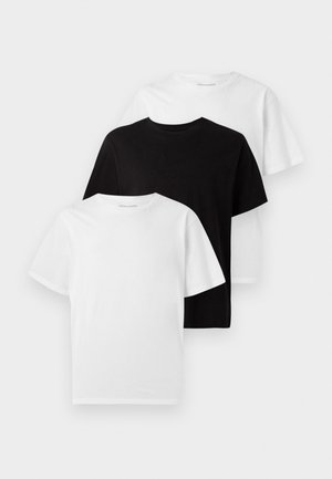 Three crew neck t-shirts: one black and two white. Short sleeves, classic fit, made from cotton with a smooth texture.