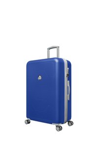 Blauwe harde koffer met hexagonaal patroon, zilveren rits, telescopische handgreep en vier wielen voor gemakkelijke mobiliteit.