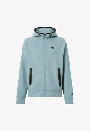 Lichtblauwe hoodie met rits en trekkoorden aan de capuchon, zwarte accenten op de zakken en manchetten, en een klein logo op de borst. Zachte stof.