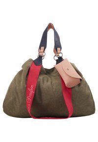 Olive green canvas bag with red and navy straps, featuring a small pink leather pouch attached. Soft texture and slouchy design.