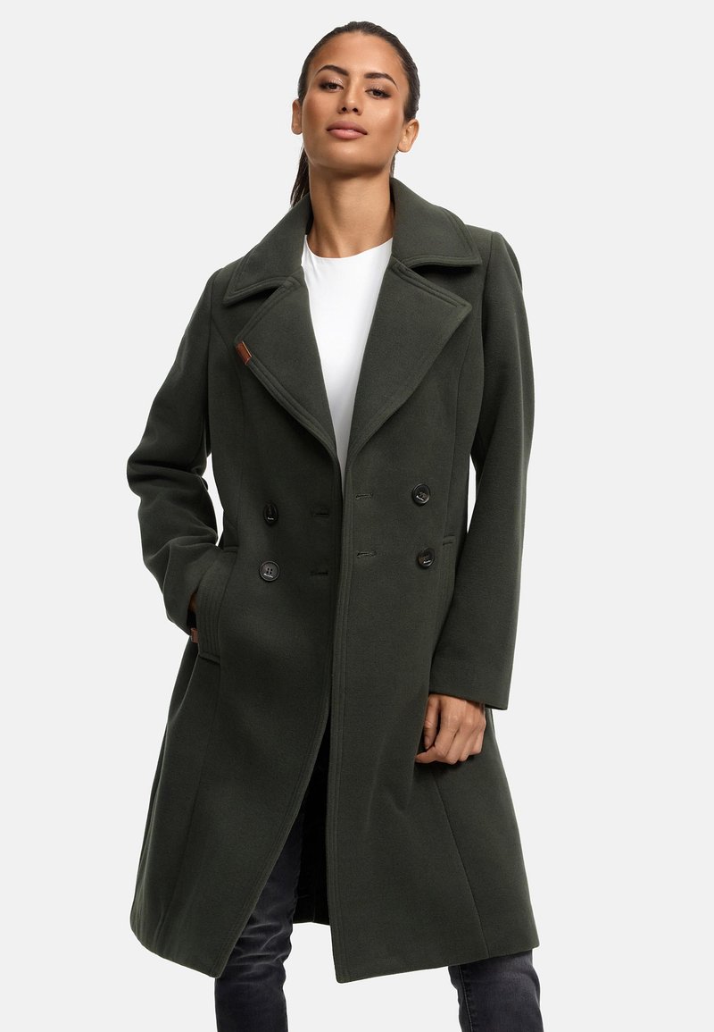 Olive green double-breasted coat made of wool blend, featuring large lapels, two side pockets, and dark buttons. Smooth texture and tailored fit.