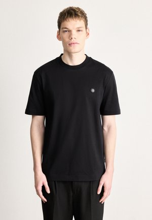 TAUT - T-Shirt basic - black