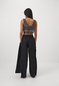 adidas Originals Tracksuit bottoms - black