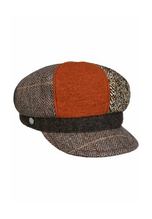 Flat cap with a short brim, featuring patchwork panels in brown herringbone, rust orange, and mixed tweed fabrics.