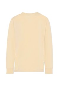 Koszula z długim rękawem w miękkim, jasnym beżowym materiale. Posiada klasyczny okrągły dekolt oraz prosty krój bez wzorów czy akcentów.