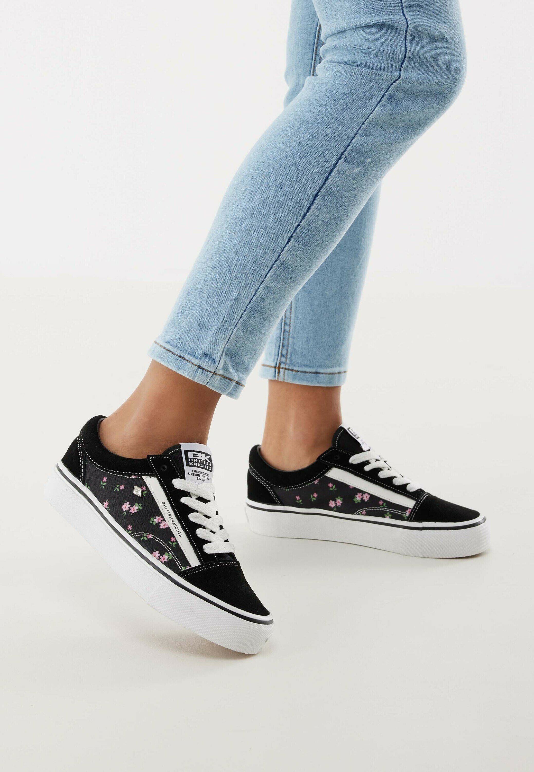 black flower trainers