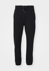 FLIGHT - Pantaloni de trening - black