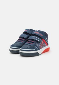 Navy blue children's sneakers with red accents, Velcro straps, textured upper, and a Spider-Man graphic on the side. Rubber sole.
