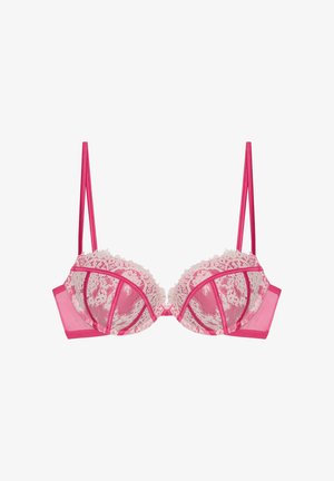 Soutien-gorge rose en dentelle avec des bonnets en mesh transparent, ornés de motifs floraux et une bande satinée lisse. Dispose de bretelles réglables et d'une fermeture à crochets.